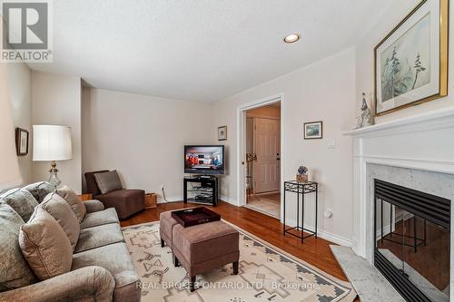 92 - 5480 Glen Erin Drive, Mississauga, ON - Indoor Photo Showing Living Room With Fireplace