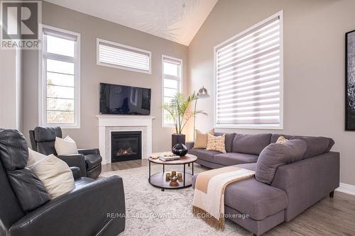 1456 Ford Strathy Crescent, Oakville, ON - Indoor Photo Showing Living Room With Fireplace