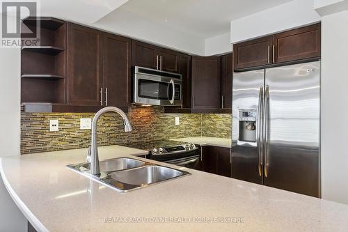 38 - 2614 Dashwood Drive, Oakville, ON - Indoor Photo Showing Kitchen With Stainless Steel Kitchen With Double Sink With Upgraded Kitchen