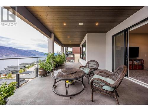 3572 Wild Rose Road, Kelowna, BC - Outdoor With Body Of Water With Deck Patio Veranda With Exterior