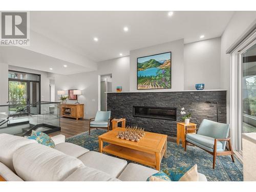 3572 Wild Rose Road, Kelowna, BC - Indoor Photo Showing Living Room With Fireplace