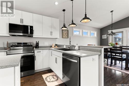 248 Thauberger Road N, Regina, SK - Indoor Photo Showing Kitchen With Double Sink