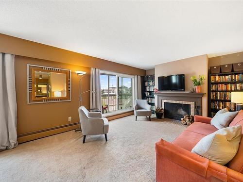 406-1188 Yates St, Victoria, BC - Indoor Photo Showing Living Room With Fireplace