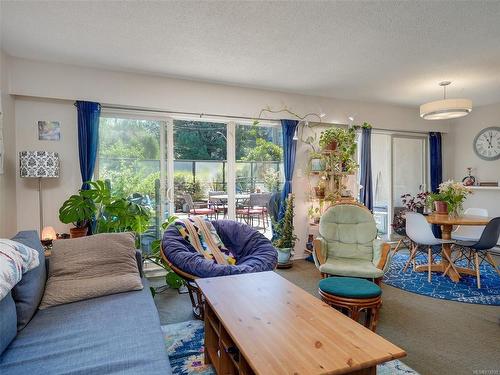 106-1545 Pandora Ave, Victoria, BC - Indoor Photo Showing Living Room