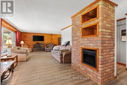 34 River Heights Road, Marmora And Lake, ON - Indoor Photo Showing Living Room With Fireplace