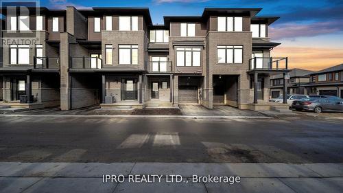 97 - 461 Blackburn Drive, Brantford, ON - Outdoor With Balcony With Facade