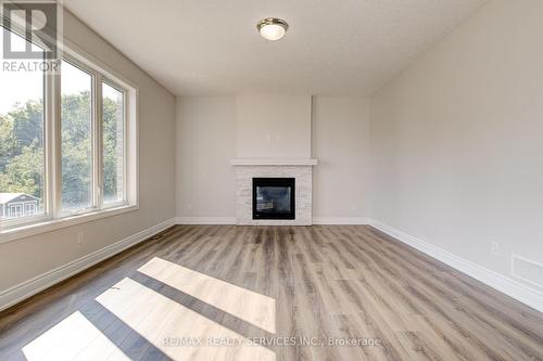 371 Masters Drive, Woodstock, ON - Indoor Photo Showing Living Room With Fireplace