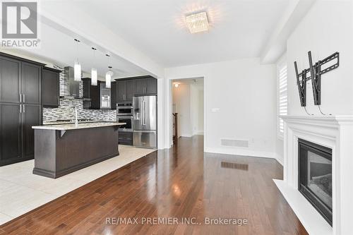 31 Cranbrook Crescent, Vaughan, ON - Indoor Photo Showing Kitchen With Fireplace