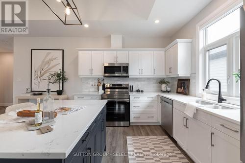 6 - 63 Compass Trail, Central Elgin (Port Stanley), ON - Indoor Photo Showing Kitchen With Double Sink