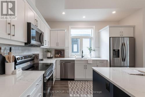 6 - 63 Compass Trail, Central Elgin (Port Stanley), ON - Indoor Photo Showing Kitchen With Stainless Steel Kitchen With Upgraded Kitchen