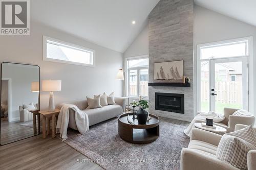 6 - 63 Compass Trail, Central Elgin (Port Stanley), ON - Indoor Photo Showing Living Room With Fireplace