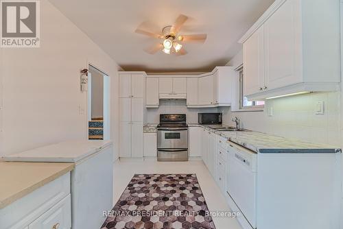 14 Milkwood Avenue, Toronto (West Humber-Clairville), ON - Indoor Photo Showing Kitchen With Double Sink