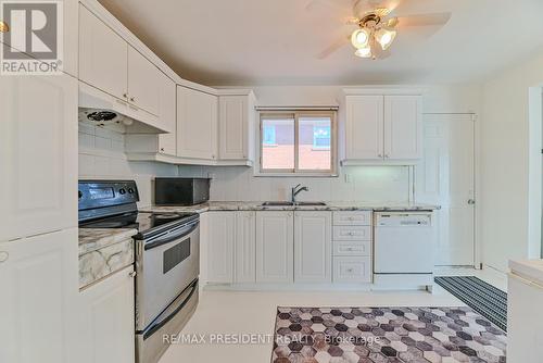 14 Milkwood Avenue, Toronto (West Humber-Clairville), ON - Indoor Photo Showing Kitchen With Double Sink