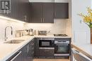 1124 - 39 Queens Quay E, Toronto (Waterfront Communities), ON  - Indoor Photo Showing Kitchen With Upgraded Kitchen 