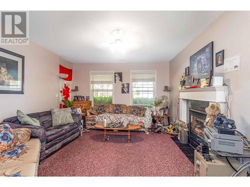 1353 Friesen Road, Kelowna, BC - Indoor Photo Showing Living Room With Fireplace