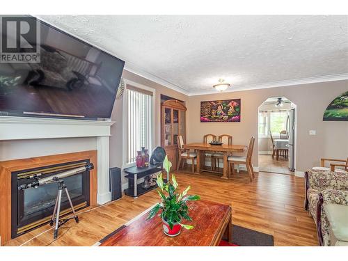 1353 Friesen Road, Kelowna, BC - Indoor Photo Showing Living Room With Fireplace