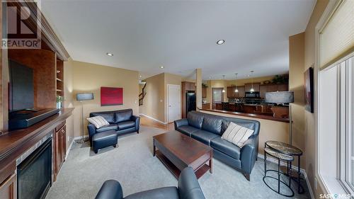 8247 Fairways West Drive, Regina, SK - Indoor Photo Showing Living Room With Fireplace