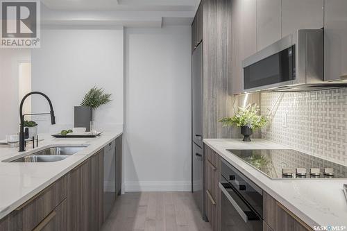 204 637 University Drive, Saskatoon, SK - Indoor Photo Showing Kitchen With Double Sink With Upgraded Kitchen