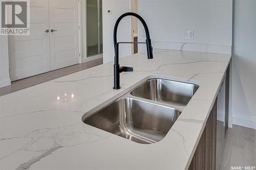 204 637 University Drive, Saskatoon, SK - Indoor Photo Showing Kitchen With Double Sink