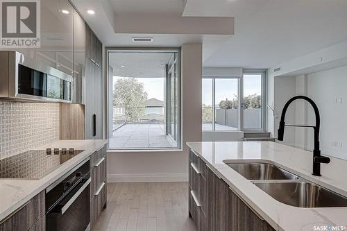 204 637 University Drive, Saskatoon, SK - Indoor Photo Showing Kitchen With Double Sink With Upgraded Kitchen