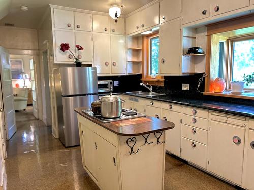 2153A Georgia Street, Rossland, BC - Indoor Photo Showing Kitchen With Double Sink