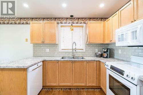 4 Marjoy Avenue, Barrie (400 North), ON - Indoor Photo Showing Kitchen With Double Sink