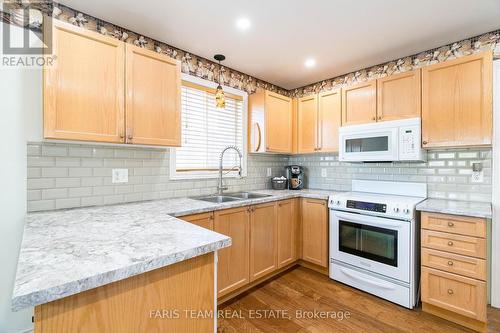 4 Marjoy Avenue, Barrie (400 North), ON - Indoor Photo Showing Kitchen With Double Sink