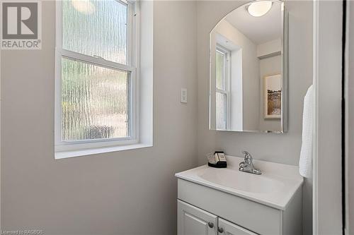 The contemporary 2-piece bathroom showcases elegant fixtures and a streamlined design. - 1371 3Rd Avenue E, Owen Sound, ON - Indoor Photo Showing Bathroom