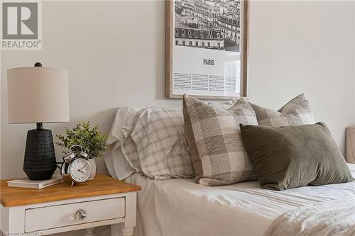 This cozy bedroom exudes warmth and tranquility, becoming the perfect place for unwinding and restful sleep. - 1371 3Rd Avenue E, Owen Sound, ON - Indoor