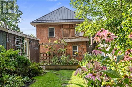 These beautifully landscaped gardens feature a colourful array of flowers and plants. - 1371 3Rd Avenue E, Owen Sound, ON - Outdoor With Balcony