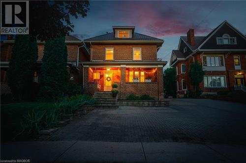 This beautifully maintained century home offers 4 bedrooms and 2 bathrooms, combining classic charm with modern amenities to provide a comfortable and inviting space for family living. - 1371 3Rd Avenue E, Owen Sound, ON - Outdoor With Facade