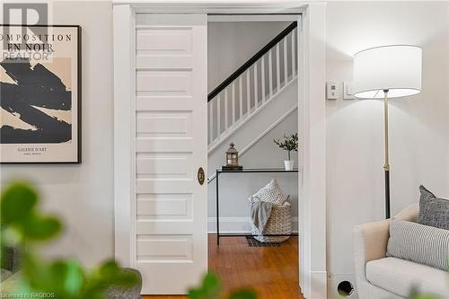 Original pocket doors add historic charm and graceful character to this beautiful century home. - 1371 3Rd Avenue E, Owen Sound, ON - Indoor Photo Showing Other Room