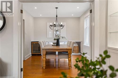 The elegant dining room features a custom built-in sideboard with wine fridge, offering both style and functionality for effortless hosting and upscale dining experiences. - 1371 3Rd Avenue E, Owen Sound, ON - Indoor Photo Showing Dining Room