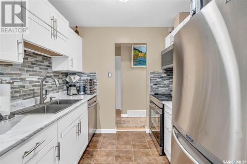 170 Sangster Boulevard, Regina, SK - Indoor Photo Showing Kitchen With Double Sink With Upgraded Kitchen