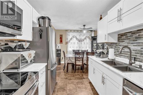 170 Sangster Boulevard, Regina, SK - Indoor Photo Showing Kitchen With Double Sink