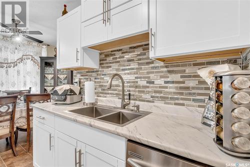 170 Sangster Boulevard, Regina, SK - Indoor Photo Showing Kitchen With Double Sink