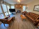 153 Logan Crescent W, Yorkton, SK  - Indoor Photo Showing Living Room With Fireplace 