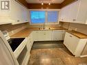 153 Logan Crescent W, Yorkton, SK  - Indoor Photo Showing Kitchen With Double Sink 