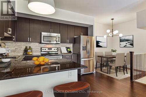 502 - 57 Macaulay Avenue, Toronto (Dovercourt-Wallace Emerson-Junction), ON - Indoor Photo Showing Kitchen With Stainless Steel Kitchen With Upgraded Kitchen