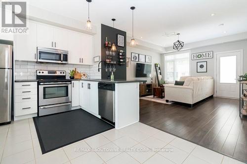 1 - 5030 Corporate Drive, Burlington (Uptown), ON - Indoor Photo Showing Kitchen With Stainless Steel Kitchen With Upgraded Kitchen