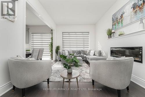 32 Dotchson Avenue, Caledon, ON - Indoor Photo Showing Living Room With Fireplace