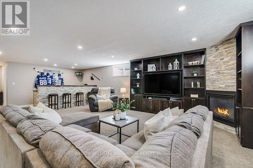 240 Krotz Street W, North Perth (32 - Listowel), ON - Indoor Photo Showing Living Room With Fireplace