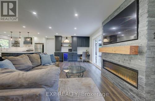 56 Main Street E, Mapleton, ON - Indoor Photo Showing Living Room With Fireplace