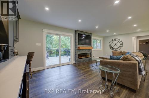 56 Main Street E, Mapleton, ON - Indoor Photo Showing Living Room With Fireplace