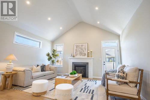 35 Lowrie Crescent, Tillsonburg, ON - Indoor Photo Showing Living Room With Fireplace