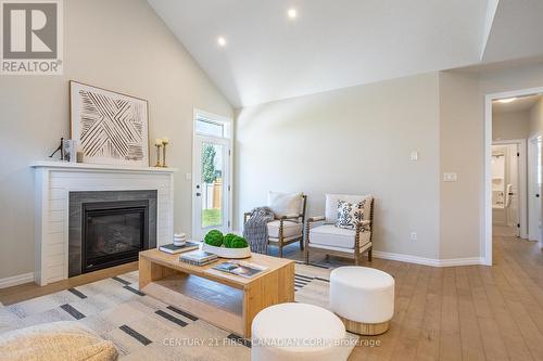 35 Lowrie Crescent, Tillsonburg, ON - Indoor Photo Showing Living Room With Fireplace