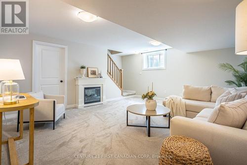 35 Lowrie Crescent, Tillsonburg, ON - Indoor Photo Showing Living Room With Fireplace