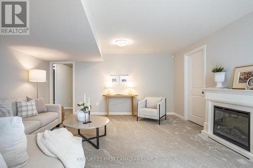 35 Lowrie Crescent, Tillsonburg, ON - Indoor Photo Showing Living Room With Fireplace