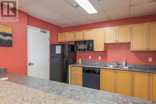 209 - 106 Aspen Springs Drive, Clarington (Bowmanville), ON - Indoor Photo Showing Kitchen