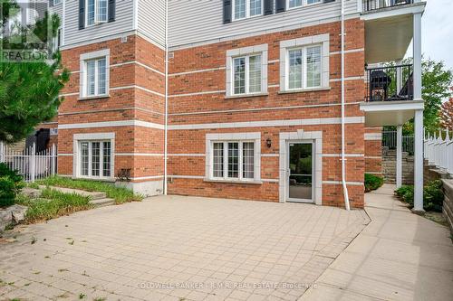 209 - 106 Aspen Springs Drive, Clarington (Bowmanville), ON - Outdoor With Balcony